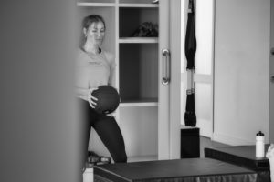 Woman with medicine ball