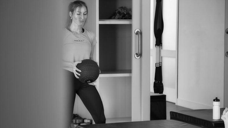 Woman with medicine ball