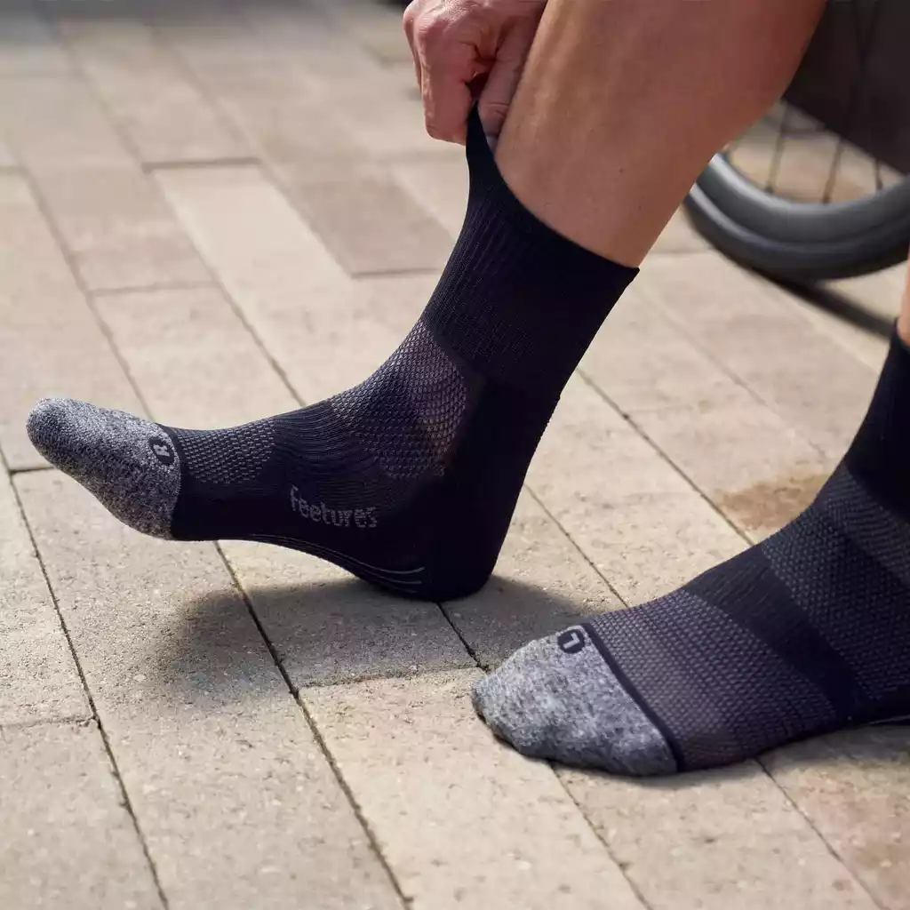 Man wearing Feetures Elite Light Cushion Quarter Socks