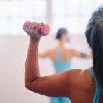 Woman with dumbell