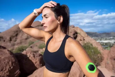 Woman wearing Nix Hydration Biosensor