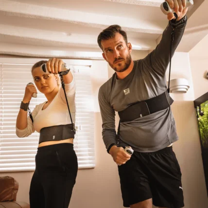 A man & a woman playing Quell game