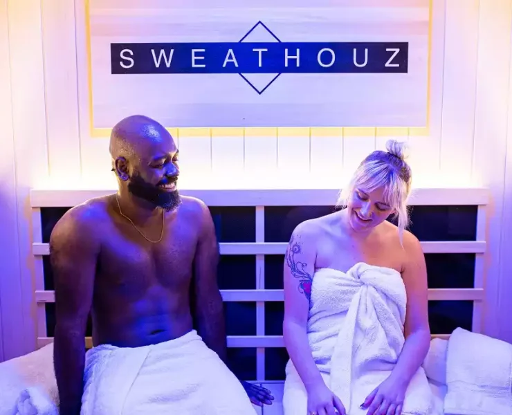 Man & woman at a Sweathouz sauna