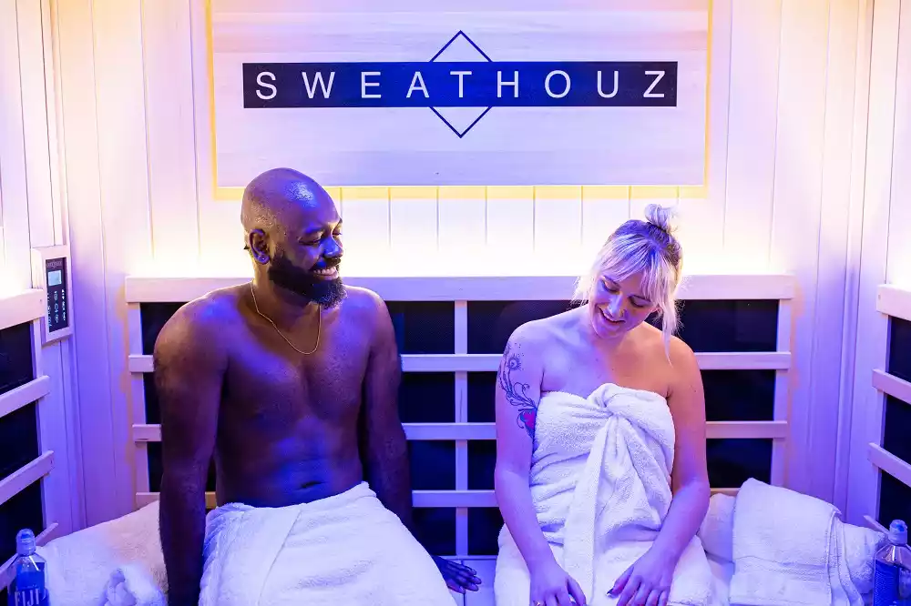 Man & woman at a Sweathouz sauna