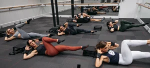 an image of Pure Barre members in a group workout setting