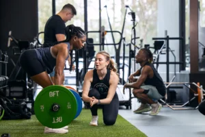 woman deadlifts at a BFT studio
