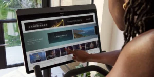 a woman riding a Peloton Bike