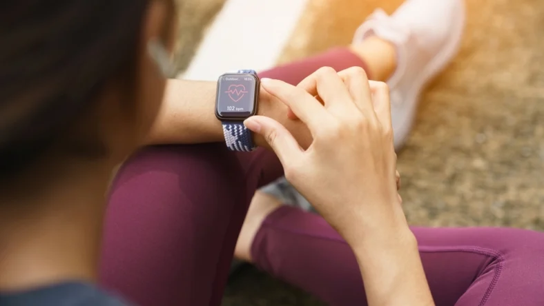 woman wears an Apple Watch
