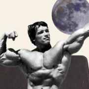 Arnold Schwarzenegger poses in a fitness app logo