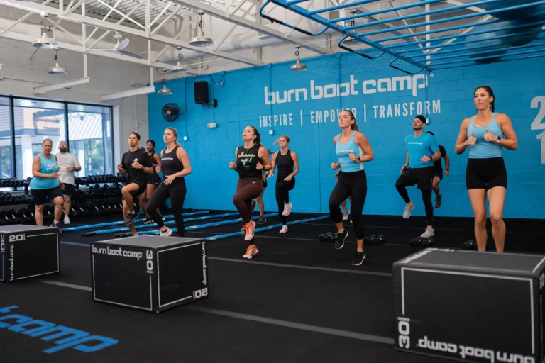 people work out inside a Burn Boot Camp
