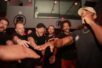 Tone House members celebrate during class