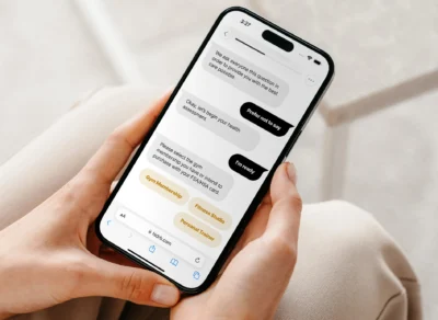 woman sends text message on her phone