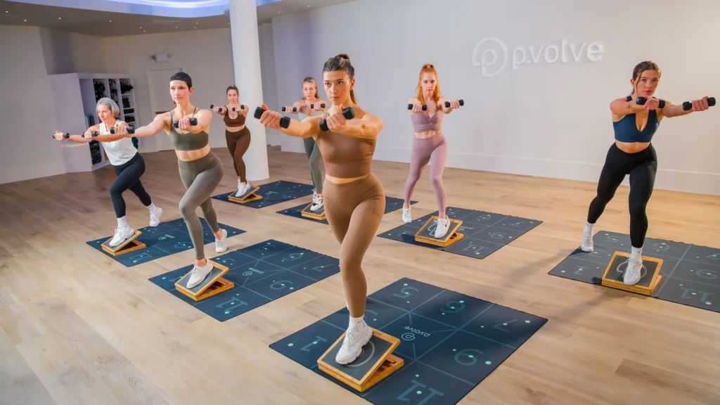 woman work out on mats at Pvolve studio