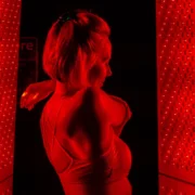 woman in red light machine