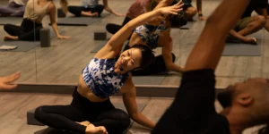 woman teaching yoga class