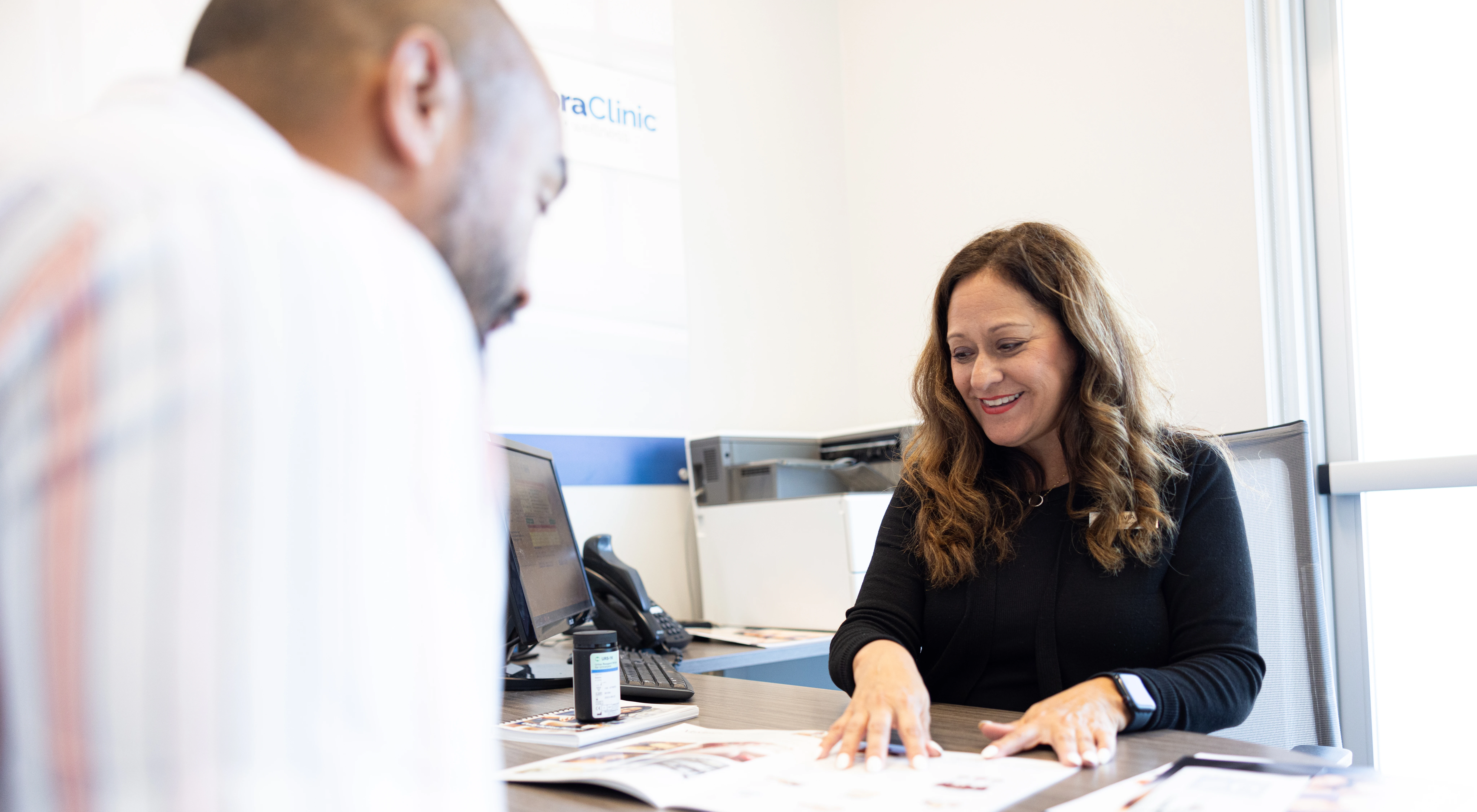 woman counseling man on weight loss