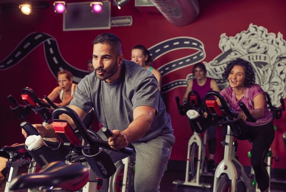 Crunch enlists Struct Club to improve cycling classes at Signature Gyms