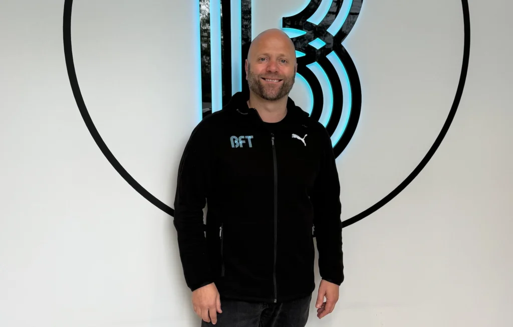 a smiling image of Tage Flugeim