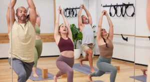 Group of diverse people doing yoga