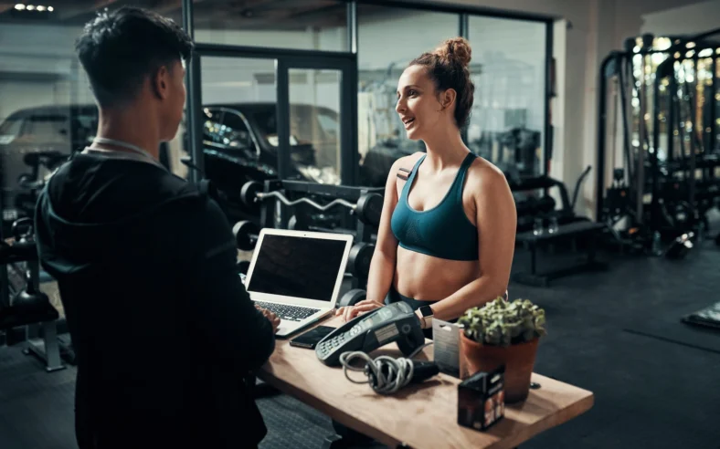 woman checks into a gym