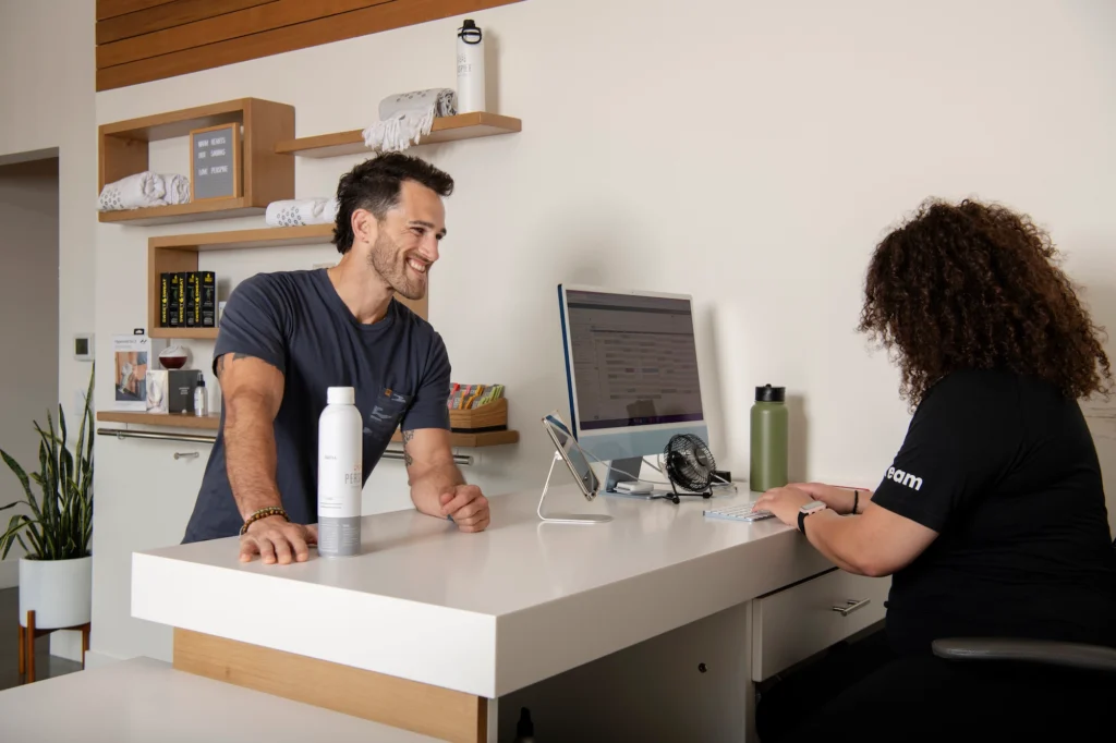 person checking into fitness facility