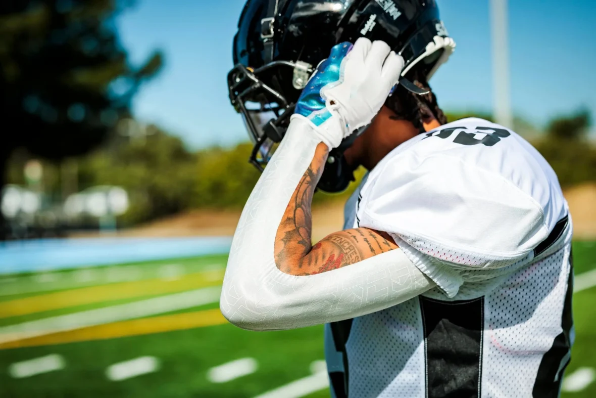 Football player wearing KT Tape