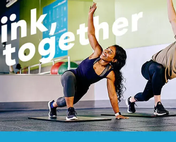 man and woman exercising at Blink fitness