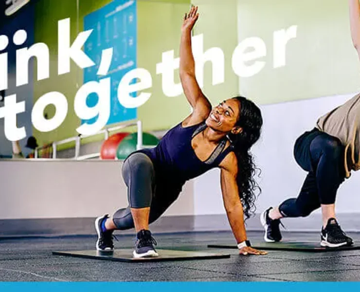 man and woman exercising at Blink fitness