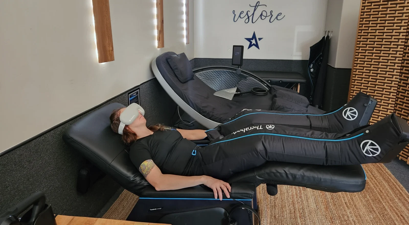 woman in recovery chair at gym