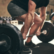 man and woman lighting weights