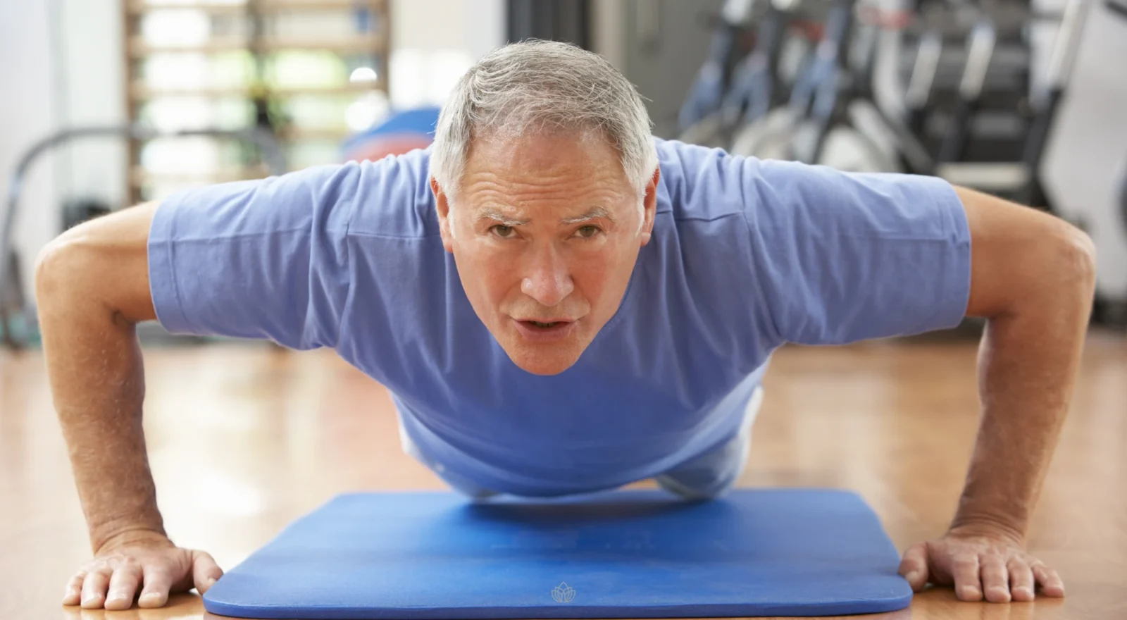 Older man doing push up