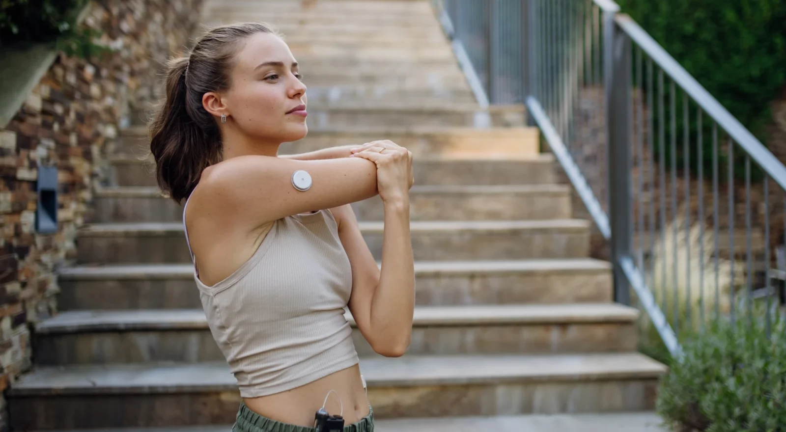 Young woman with diabetes running