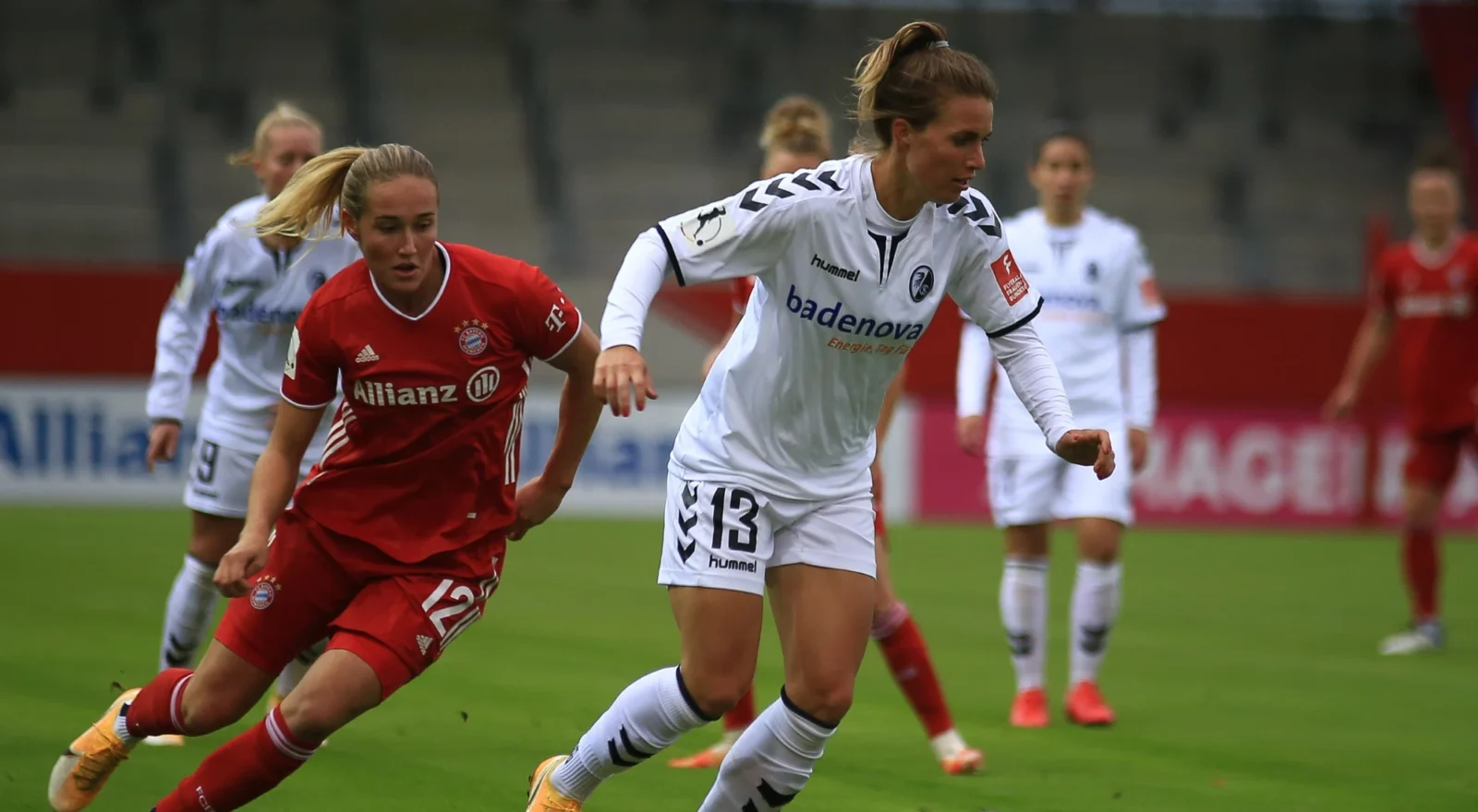 Women playing soccer