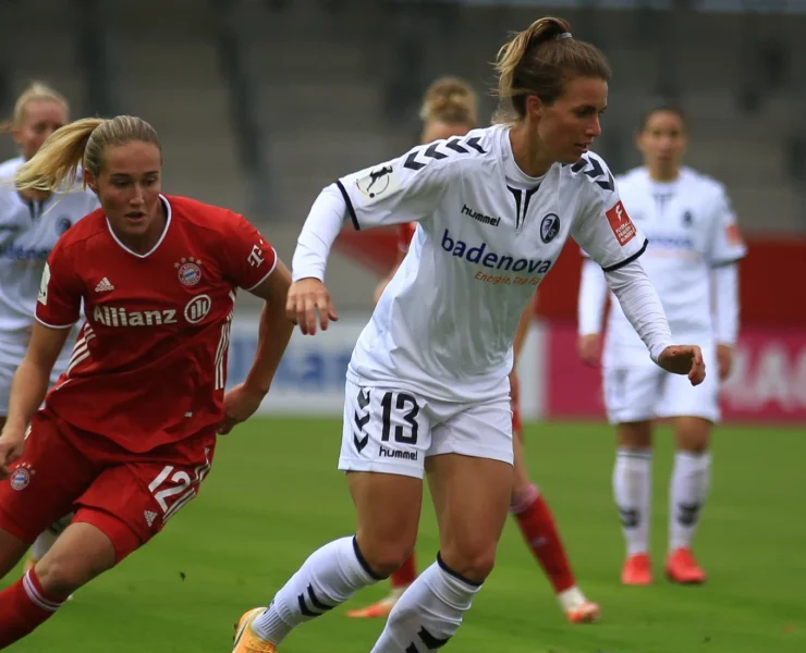 Women playing soccer