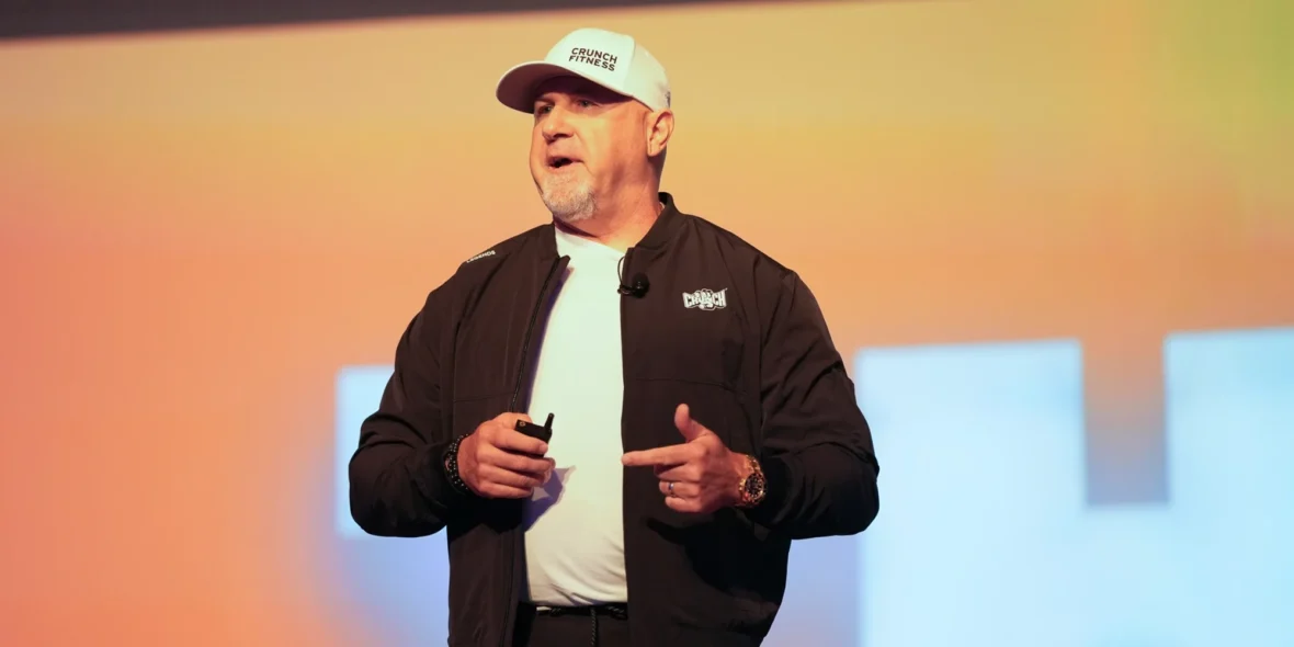 Crunch CEO Jim Rowley talking on a stage