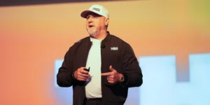 Crunch CEO Jim Rowley talking on a stage