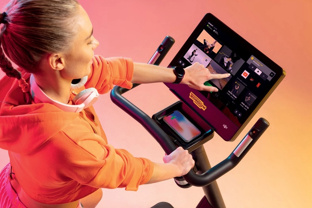 woman on Technogym machine