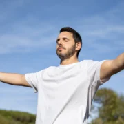 A man practices proper breathwork