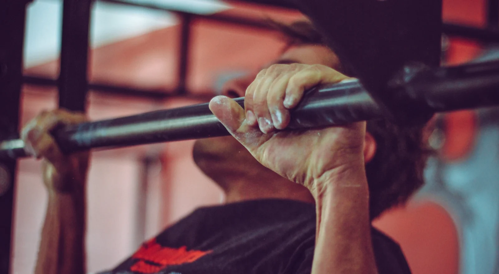 black man doing a pullup