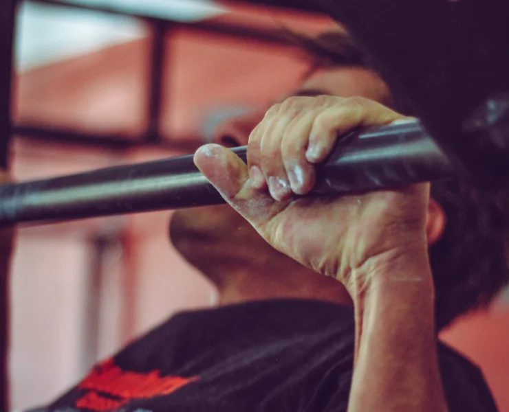 black man doing a pullup