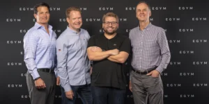 EGYM team poses after securing investment