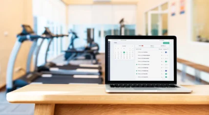 Laptop open inside a gym