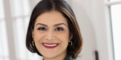 a smiling headshot of Sima Sistani