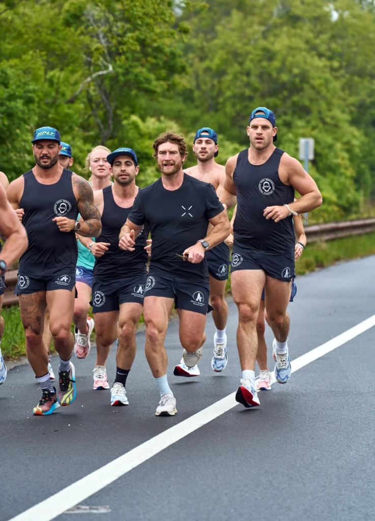 men and women run as part of a run club