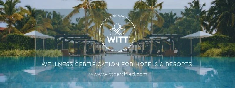 An image of a serene pool with text announcing WITT's new wellness tourism initiative.