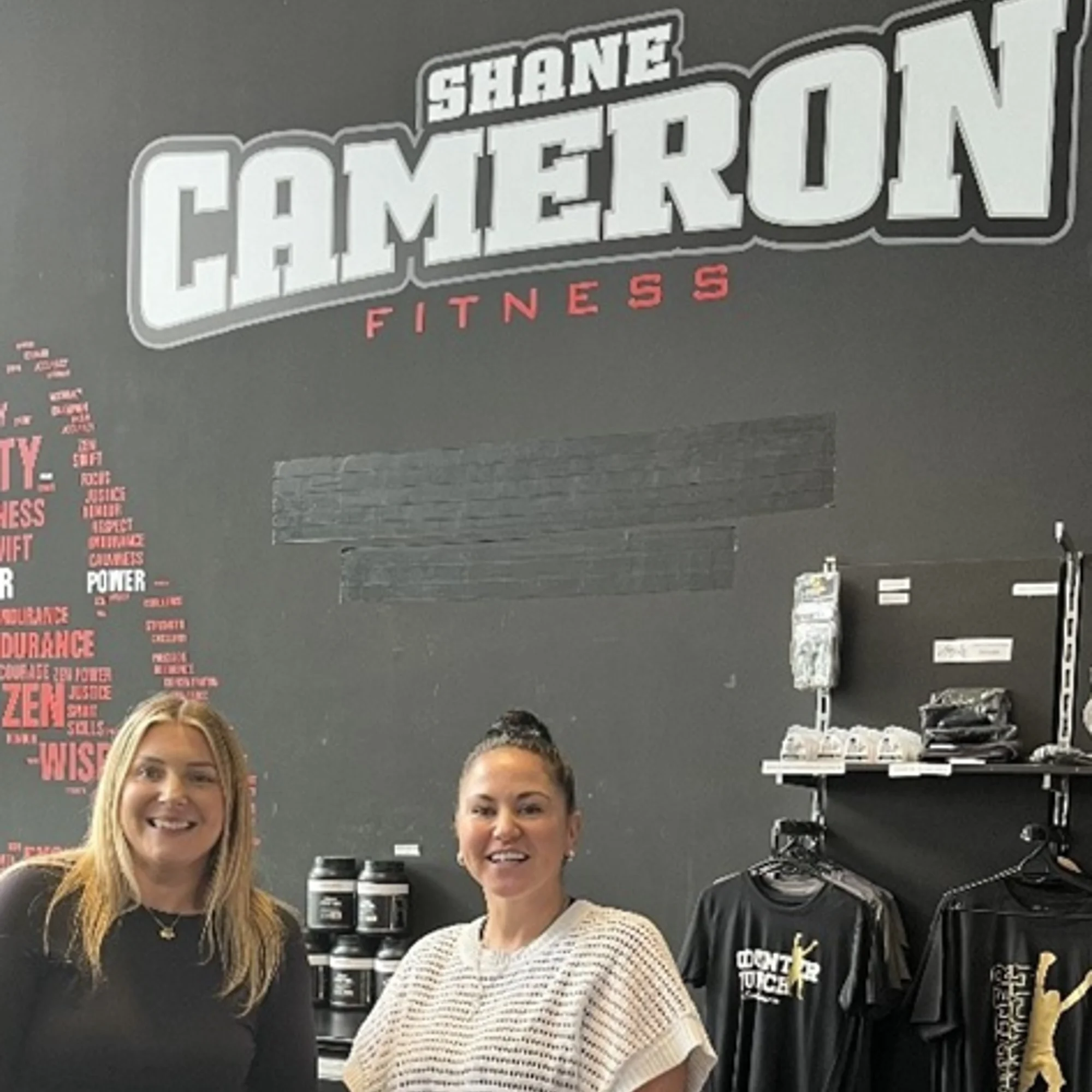 a smiling image of two women at Shane Cameron Fitness