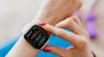 woman checking her smart watch