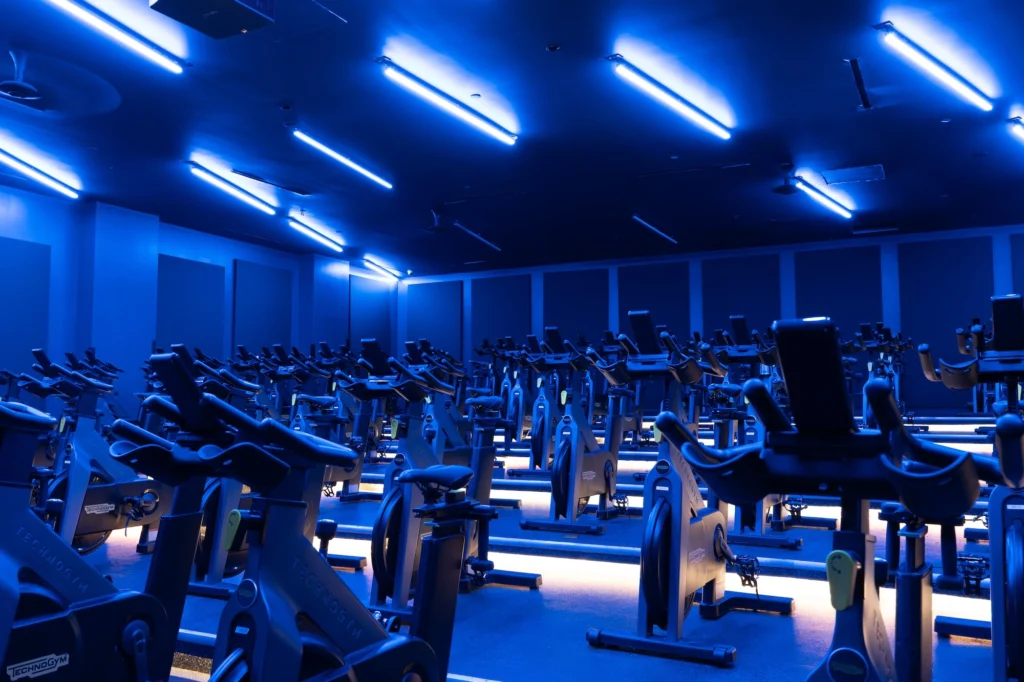 fitness studio featuring indoor cycling bikes