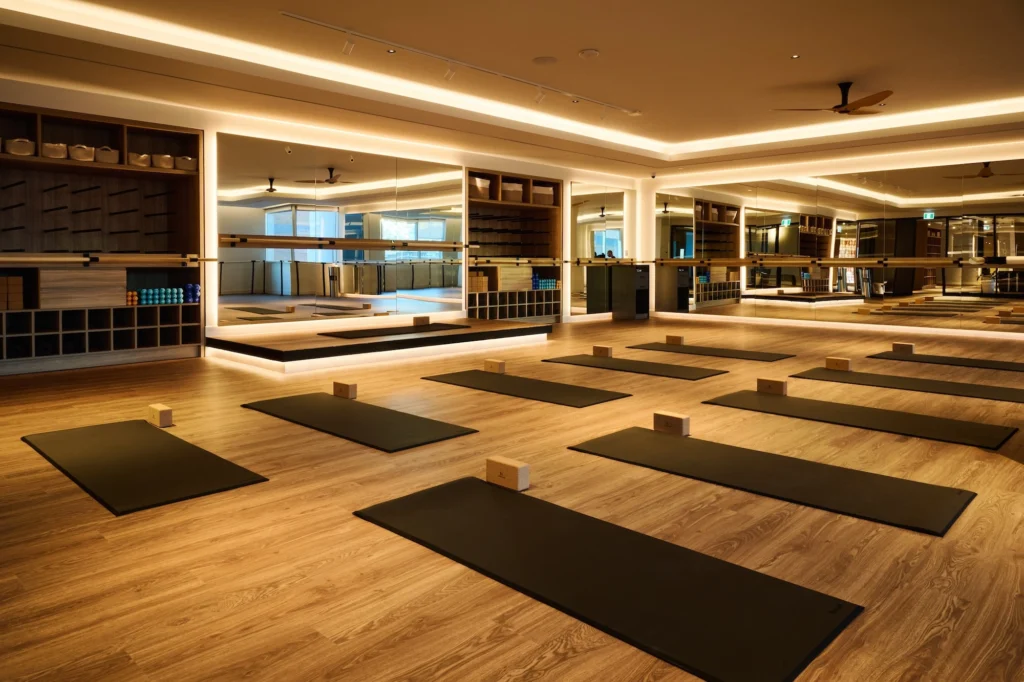 Boutique fitness studio featuring yoga mats