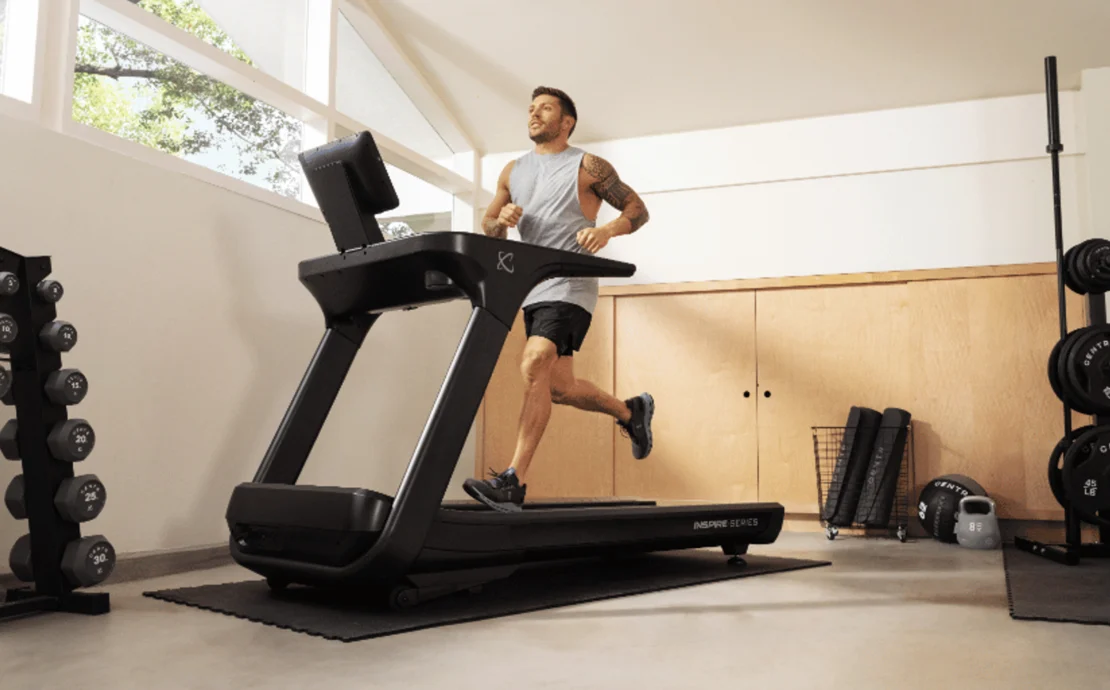 a man running on a new Centr treadmill